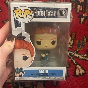 Funko Haunted Mansion Maid with Orange Hair and Blue Outfit